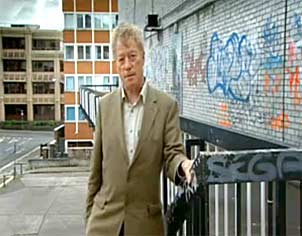 Roger Scruton in his now blighted hometown of Redding, near London. He tells us that: "Beauty is assailed from two directions, by the cult of ugliness in the arts, and by the cult of utility in everyday life. These two cults come together in the world of modern architecture." Screen capture from "Why Beauty Matters."
