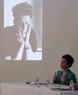 Dr. Catha Paquette and a projected image of Siqueiros. Photo by Jeannine Thorpe ©