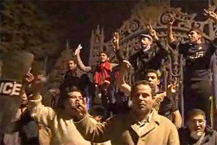 Pro-Democracy demonstrators rushed to protect the Egyptian Museum; they are pictured here guarding the museum entry gate in a still from a video by Euronews. Photo courtesy of AFP