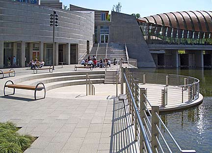 View of the Walker Landing Plaza between galleries at the Crystal Bridges Museum of American Art in Bentonville, Arkansas USA. Photograph by Charvex/Wikimedia Creative Commons.