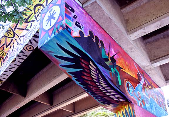 "The 'Tribute to Allende mural' is wrapped around a massive concrete column that holds up the freeway, so the artists took advantage of the architectural support and made their work three dimensional." Photograph by Mark Vallen ©